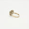 Bague 55 Bague motif floral en platine et or gris avec diamants et émeraude 58 Facettes 240356