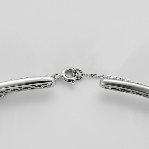 Collier Collier torque en or gris 750‰ pavé de diamants 58 Facettes 250176