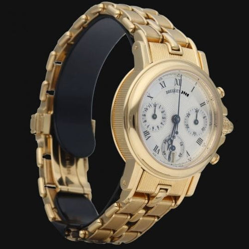 Montre Breguet Marine - Montre chronographe en or jaune 18K 58 Facettes MT41185