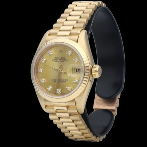 Montre Rolex Datejust - Montre Lady 26 mm en or jaune avec diamants 58 Facettes MT42408