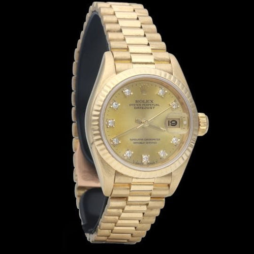 Montre Rolex Datejust - Montre Lady 26 mm en or jaune avec diamants 58 Facettes MT42408
