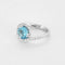 Bague 49 Bague tourbillon en or blanc, topaze et diamants 58 Facettes B250558