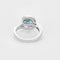 Bague 49 Bague tourbillon en or blanc, topaze et diamants 58 Facettes B250558