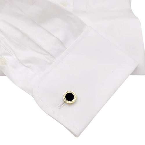 Boutons de manchette Boutons de manchette Bulgari "BULGARI BULGARI", or jaune et onyx. 58 Facettes 35246