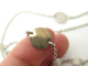 Collier collier HERMES sautoir confettis ex-libris en argent 925 or jaune 58 Facettes 271754