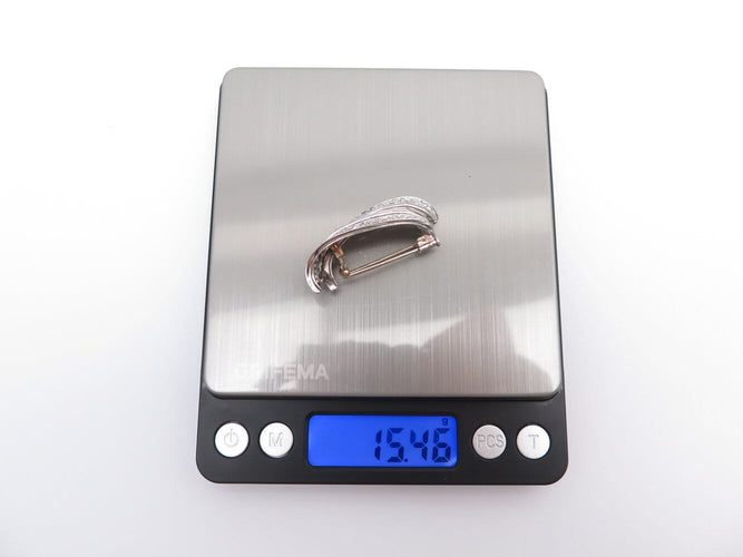 Broche broche 1960 sertie diamants baguette & ronds 9ct platine 15.4gr 58 Facettes 273027