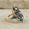 https://cdn.shopify.com/s/files/1/0442/6560/3235/files/Jugendstilring-mit-Amethyst-Diamantrosen-und-P-321.png?v=1792754345