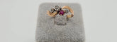 Bague 55 Bague en or jaune, rubis et diamants 58 Facettes