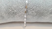 Bracelet Gourmette en or blanc 18 carats 58 Facettes