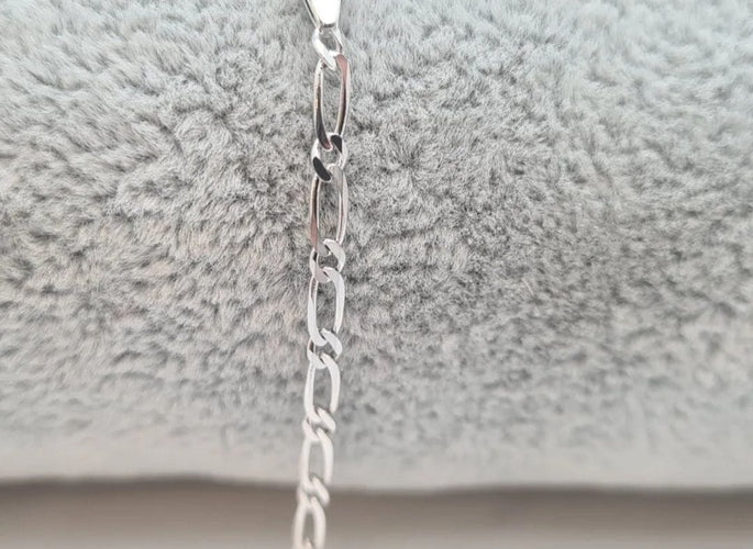 Bracelet Gourmette en or blanc 18 carats 58 Facettes
