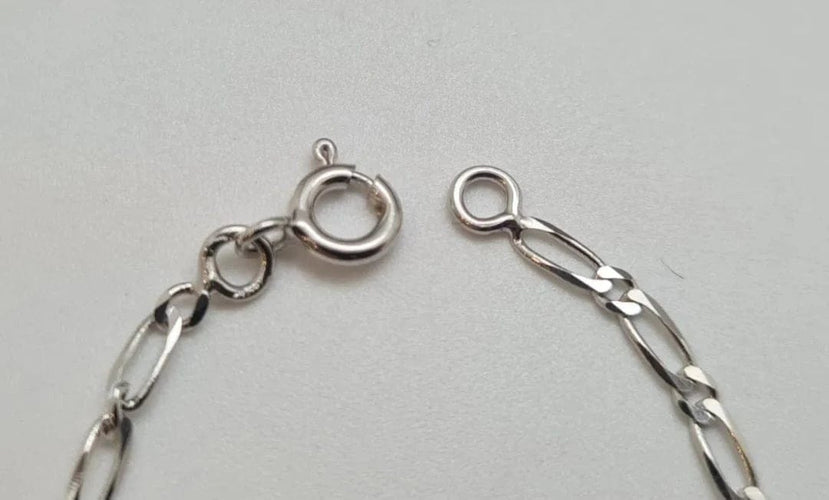 Bracelet Gourmette en or blanc 18 carats 58 Facettes