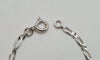 Bracelet Gourmette en or blanc 18 carats 58 Facettes
