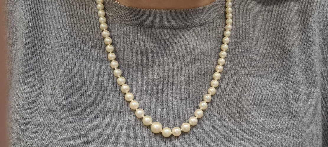 Collier Collier en or jaune 18 carats et perle de culture 58 Facettes