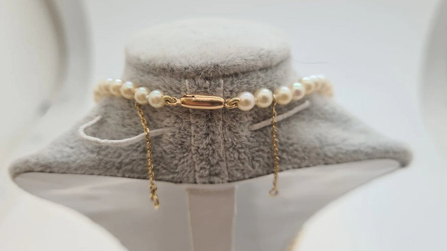 Collier Collier en or jaune 18 carats et perle de culture 58 Facettes