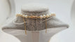 Collier Collier en or jaune 18 carats et perle de culture 58 Facettes