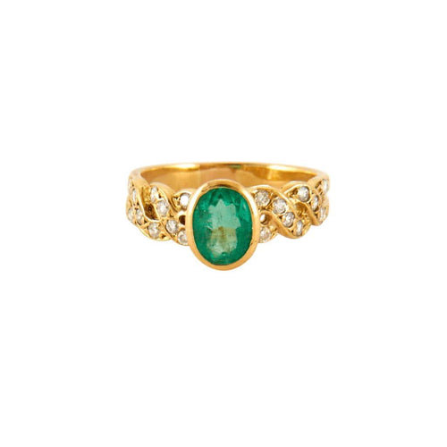 Bague 55 Bague en or jaune 18 ct, diamants et émeraude 58 Facettes