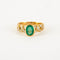 Bague 55 Bague en or jaune 18 ct, diamants et émeraude 58 Facettes