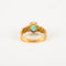 Bague 55 Bague en or jaune 18 ct, diamants et émeraude 58 Facettes