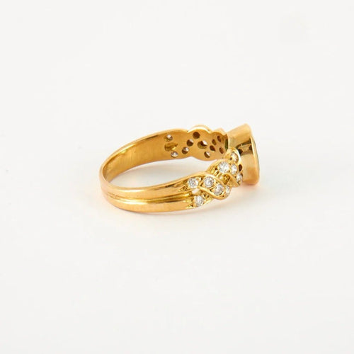 Bague 55 Bague en or jaune 18 ct, diamants et émeraude 58 Facettes