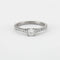 Bague 54 Bague solitaire en or blanc et diamants 58 Facettes