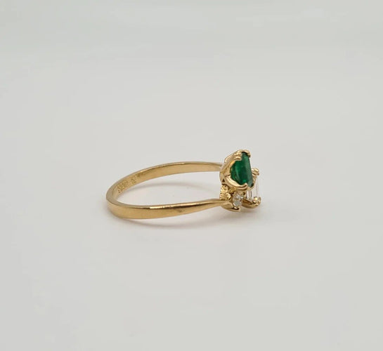 Bague 49.5 Bague en or jaune 18 carats, émeraude et diamants 58 Facettes