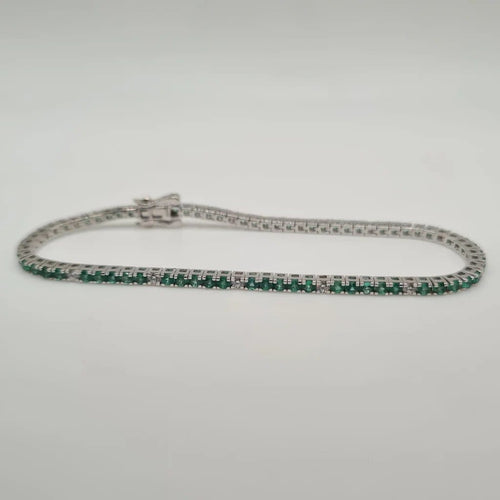 Bracelet Bracelet rivière en or blanc, diamants et émeraudes 58 Facettes