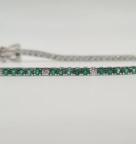 Bracelet Bracelet rivière en or blanc, diamants et émeraudes 58 Facettes
