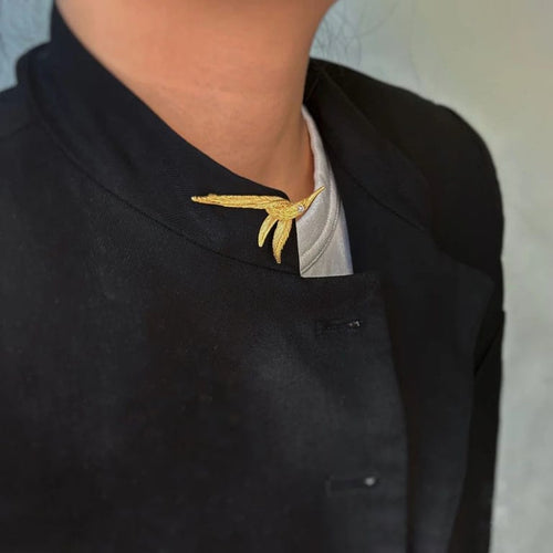 Broche Broche oiseau en or jaune 750‰ et diamant 58 Facettes 240342R