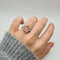 Bague 52 Bague fleur en or blanc et diamants 58 Facettes