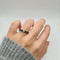 Bague 54 Bague en or blanc et diamants blancs et noirs 58 Facettes