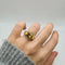 Bague 54.5 Bague bombée en or jaune 18 carats, citrine et diamants 58 Facettes