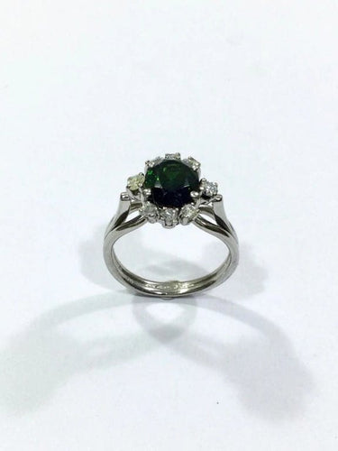 Bague 52 Bague en or blanc 18 carats avec diamants et pierre verte synthétique 58 Facettes
