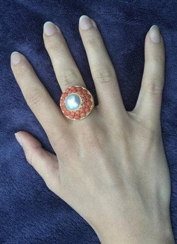 Bague 50.5 Bague en or jaune 18 carats avec perle et corail 58 Facettes 626374