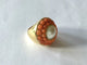 Bague 50.5 Bague en or jaune 18 carats avec perle et corail 58 Facettes 626374