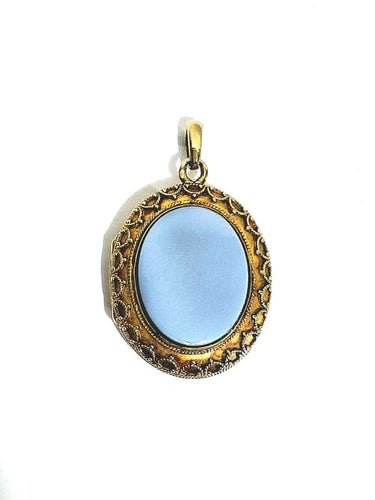 Pendentif Pendentif médaillon photo en or jaune 18 carats et onyx 58 Facettes 940723