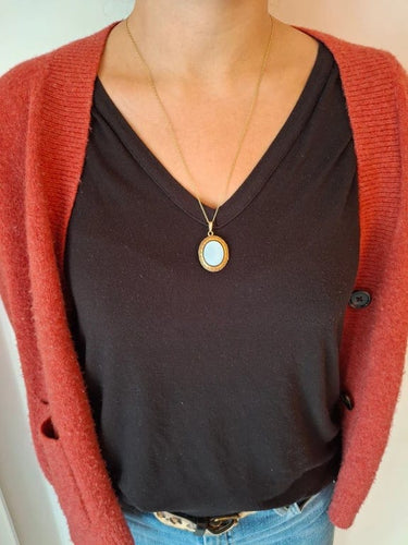 Pendentif Pendentif médaillon photo en or jaune 18 carats et onyx 58 Facettes 940723