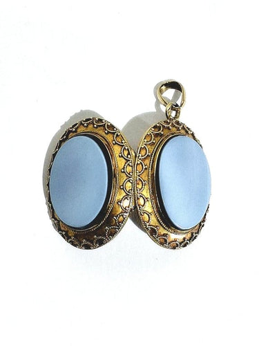 Pendentif Pendentif médaillon photo en or jaune 18 carats et onyx 58 Facettes 940723