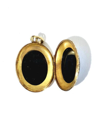 Pendentif Pendentif médaillon photo en or jaune 18 carats et onyx 58 Facettes 940723