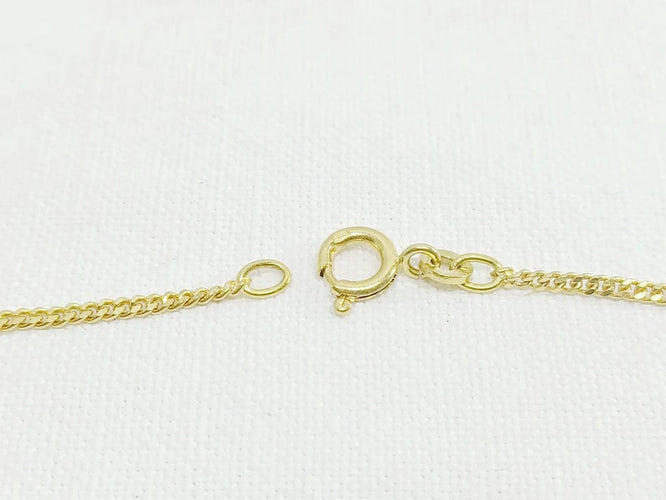 Collier Chaîne maille gourmette en or jaune 18 carats 58 Facettes 3053/1