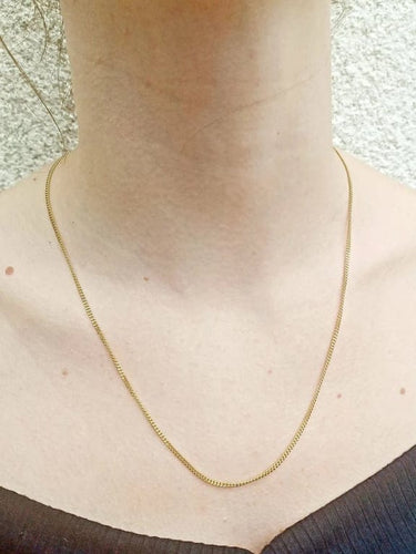 Collier Chaîne maille gourmette en or jaune 18 carats 58 Facettes 3053/1