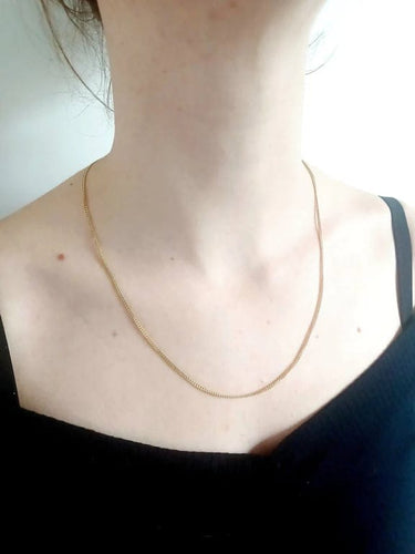 Collier Chaîne maille gourmette en or jaune 18 carats 58 Facettes 3053/1