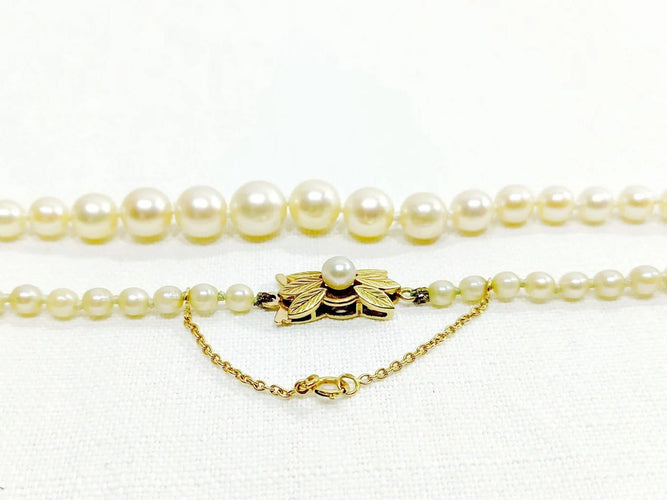 Collier Collier de perles de culture en or 18 carats 58 Facettes 3117