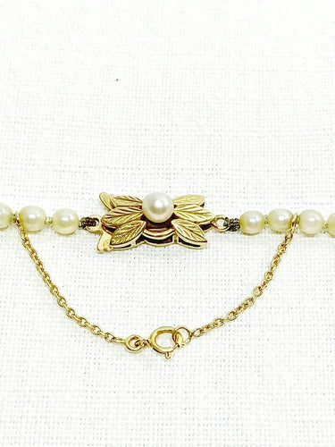 Collier Collier de perles de culture en or 18 carats 58 Facettes 3117