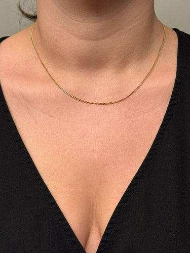 Collier Chaîne gourmette en or rose 18 carats 58 Facettes