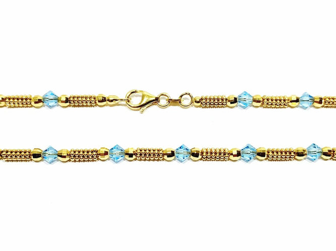 Collier Collier en or jaune 18 carats et perles de verre bleues 58 Facettes