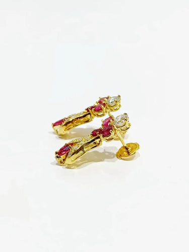 Boucles d'oreilles Boucles d’oreilles articulées en or jaune 18 carats, rubis et diamants 58 Facettes