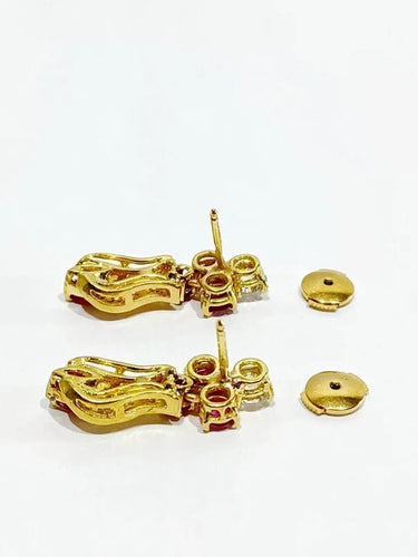 Boucles d'oreilles Boucles d’oreilles articulées en or jaune 18 carats, rubis et diamants 58 Facettes