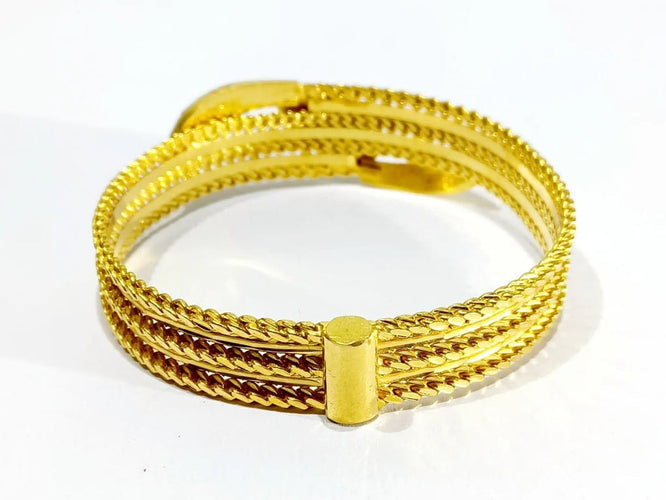 Bracelet Bracelet serpent rigide en or jaune 18 carats et rubis 58 Facettes