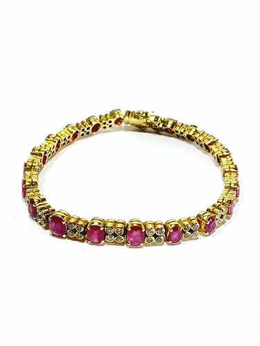 Bracelet Bracelet en or jaune, diamants et rubis 58 Facettes