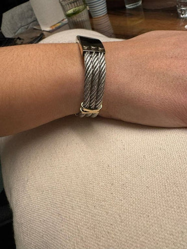 Bracelet Bracelet en or jaune 18 carats et argent à câbles tressés 58 Facettes
